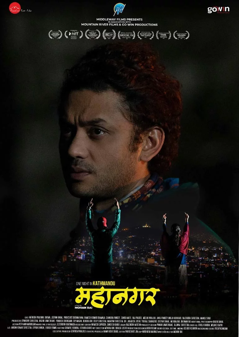 Official poster of Mahanagar 2023
                                                                                                      featuring Karma Shakya, Menuka Pradhan, Jeevan Baral, Parikshit Bikram Rana, Ramesh Kumar Dhamala, Chandra Pandey, Sunita Mote, Raj Poudel, Melin Parajuli, Anoj Pandey, Sebita Adhikari, Rajendra Shrestha and Manoj Shah
                                                                                                                                                       , directed by Mohan Rai
                                                 